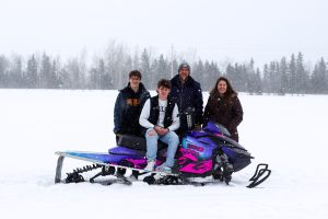 Students on Snowmobile
