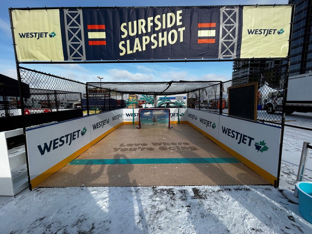 The activation area was based around a small version of an ice hockey rink. However, the twist was that instead of the usual cold ice surface, this was transformed to mimic a sandy beach