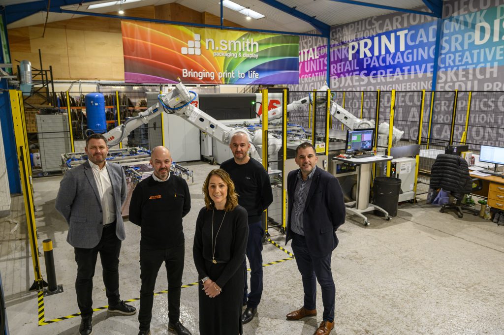 L-R: Paul Fitch - Agfa, Nigel Reynolds MD at N Smith, Kerry Tyers Director & General Manager at N Smith, Gary Hogg Operations Director at N Smith and James Argent - Agfa by the newly installed Agfa Onset X3 HS print engine