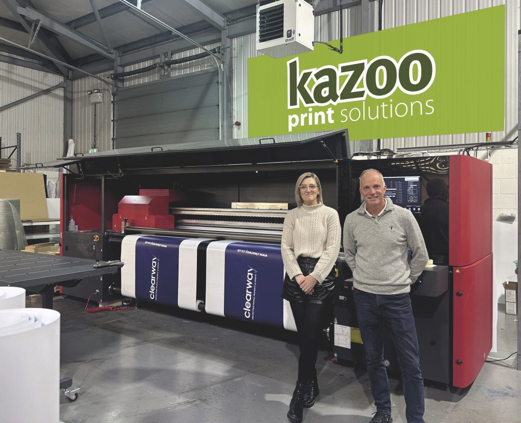 Kazoo’s new EFI Pro 30h running dual feed, pictured with Simon Talbot, Director, and Charlotte Smallman, Operations Director.