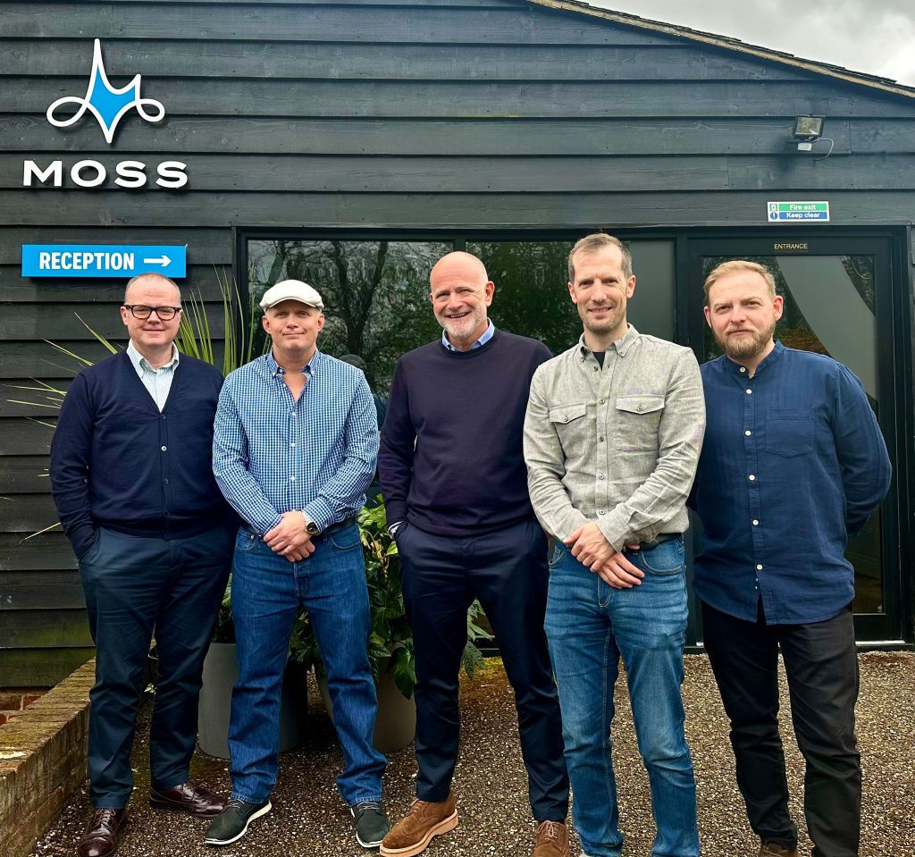 Moss team outside newly branded UK headquarters