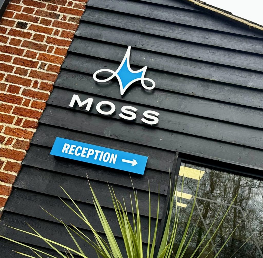 Moss logo on building